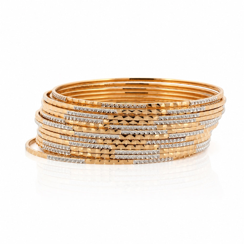 18K yellow and white diamond-cut bangles stacked together