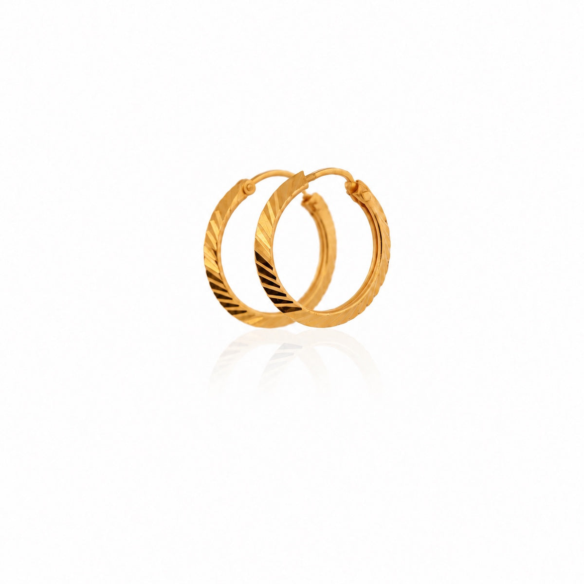 The Soleil Hoops 21k yellow gold earrings