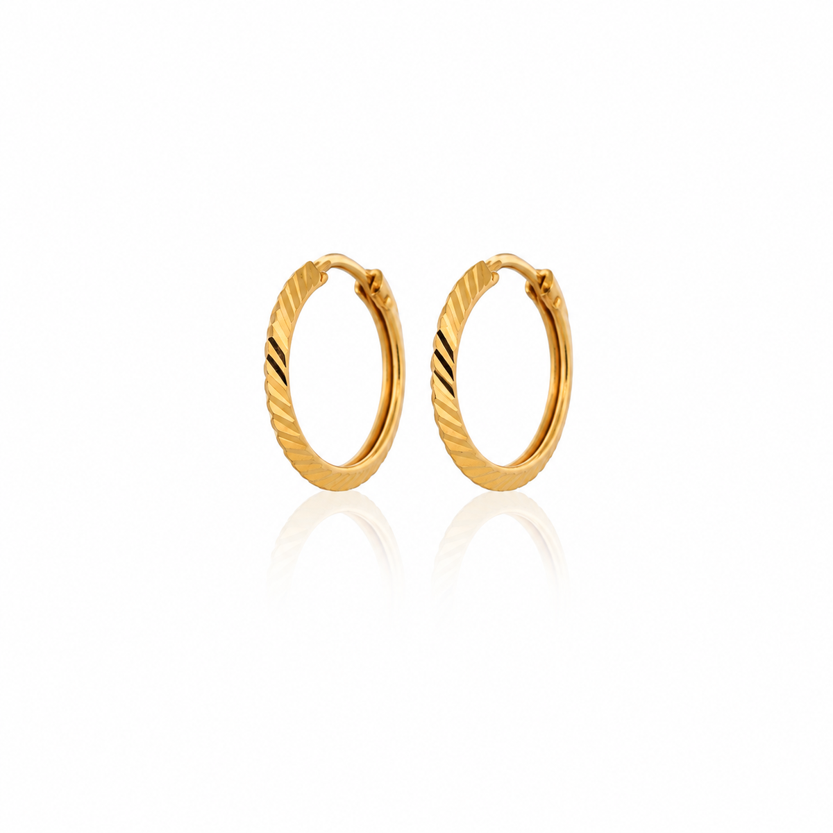 The Soleil Hoops 21k yellow gold earrings