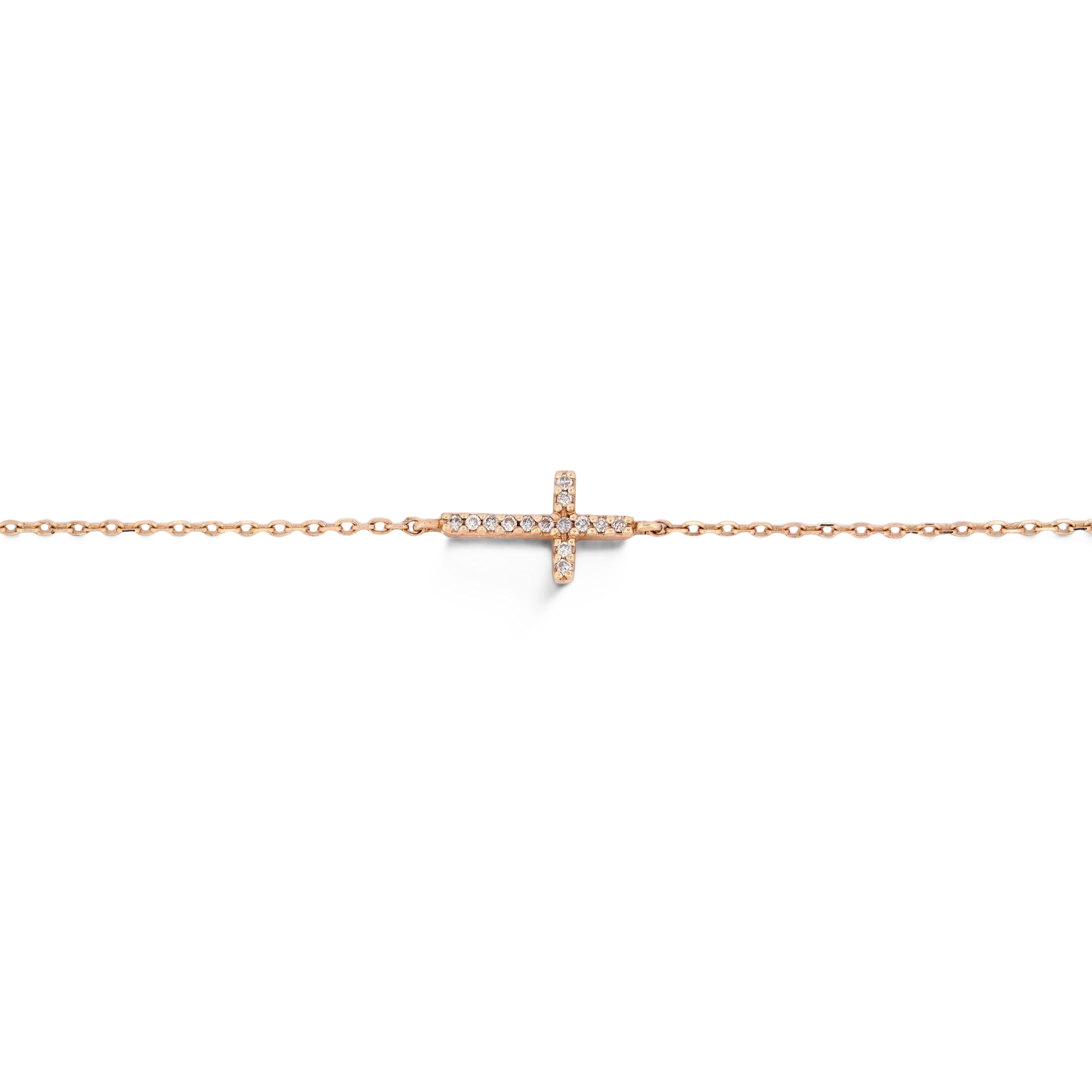 Gemmas Jewelry Edit Lucia Cross Bracelet with natural diamonds on a delicate 14k yellow gold bracelet, adjustable fit.