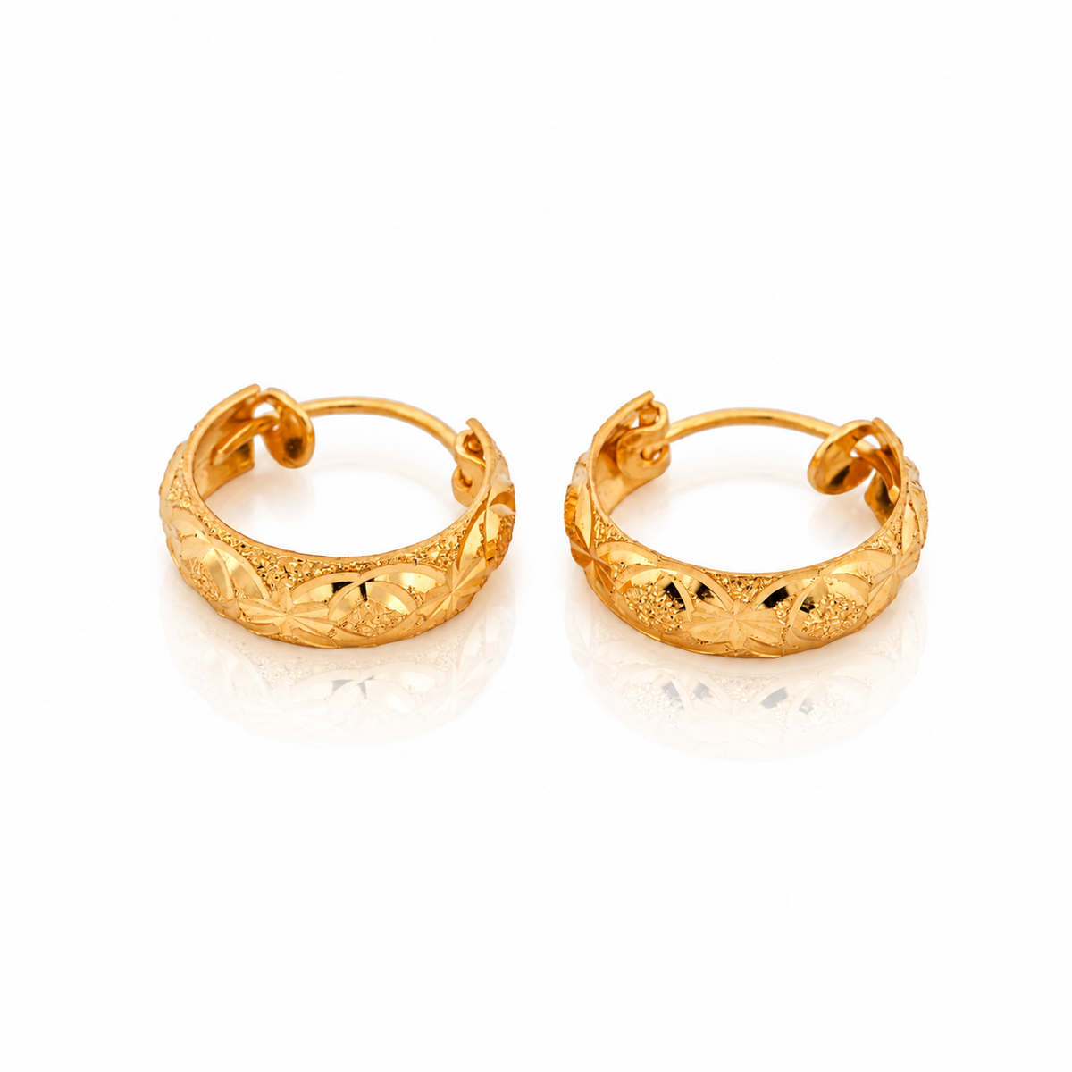 The Lumina Hoops 21k yellow gold earrings