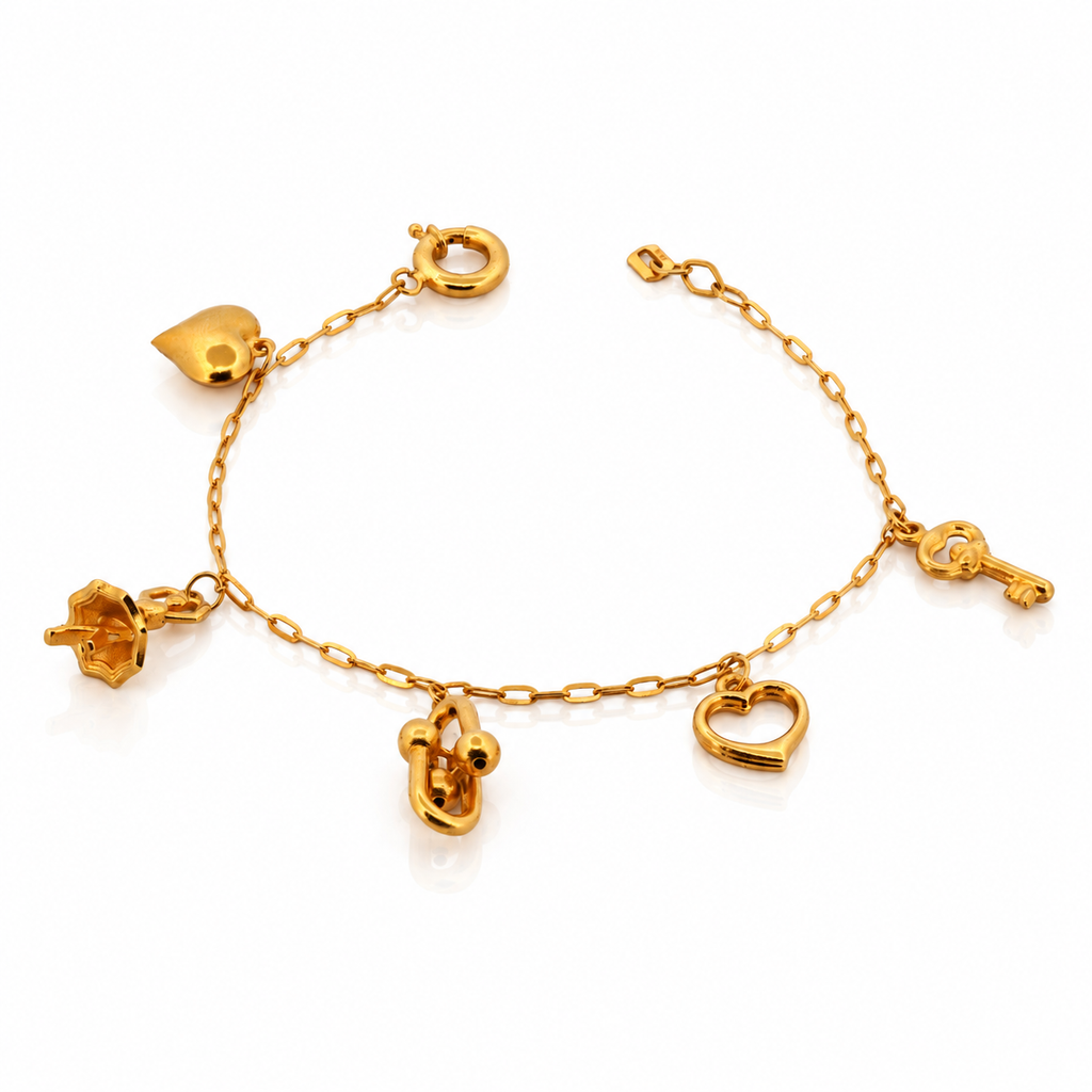 21k yellow gold ballerina charm bracelet