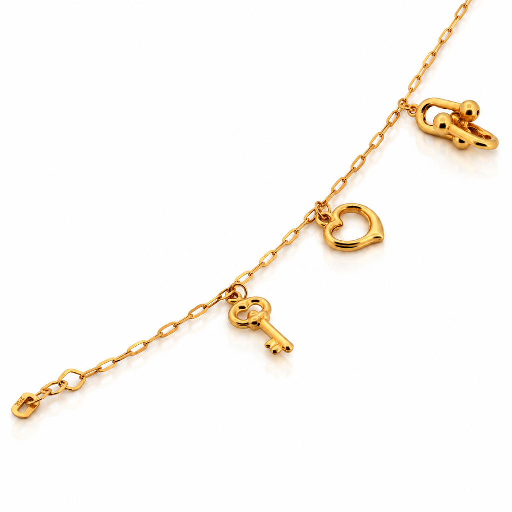 21k yellow gold ballerina charm bracelet