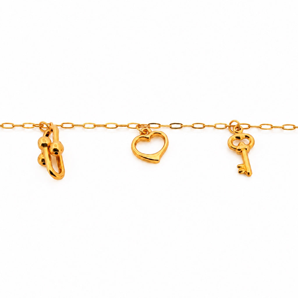 21k yellow gold ballerina charm bracelet